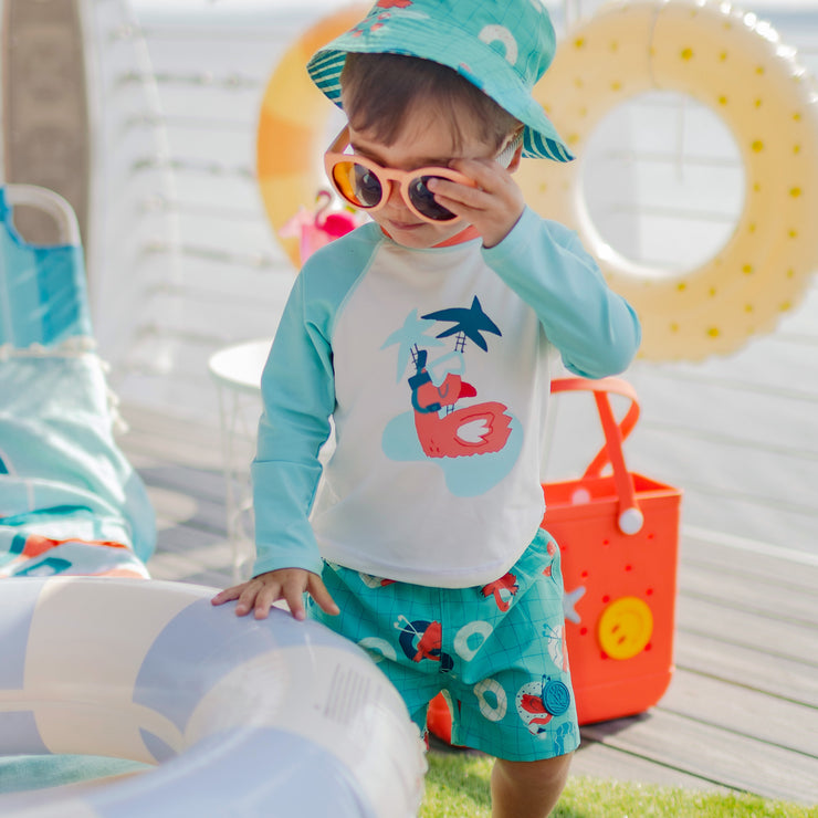 Cream swimming t-shirt with aqua blue long sleeves, baby