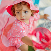 Reversible pink sun hat with flamingo all over print, baby