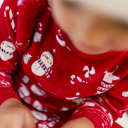 Pyjama deux pièces rouge en velours avec motifs des fêtes, enfant