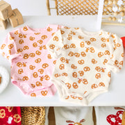 Pink Valentine's Day bodysuit in stretch jersey with pretzel all over print, baby