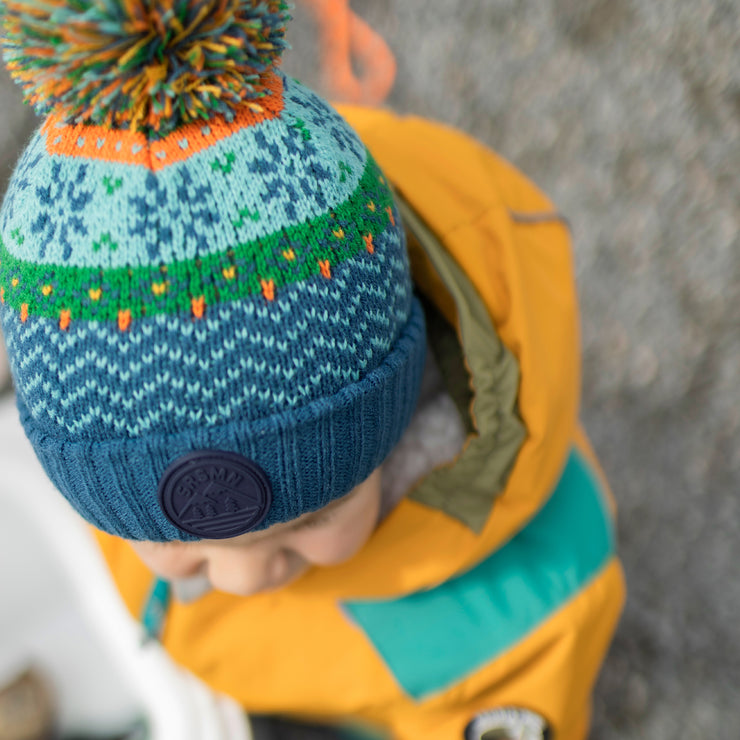 Blue, green, orange and turquoise toque with print and pompon, baby