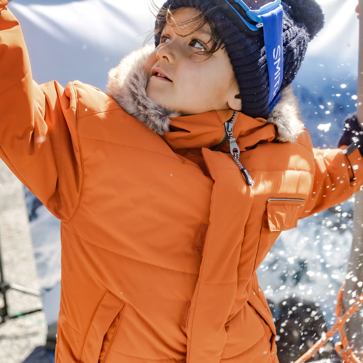 Habit de neige deux pièces orange brulé et bleu à motifs, enfant || Two-piece burnt orange and blue snowsuit with all over print, child