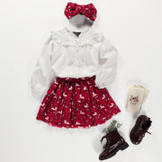 Jupe courte rouge avec motifs de rennes en viscose, enfant || Red short skirt with reindeer all over print in viscose, child