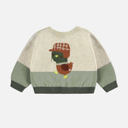 Veste de maille crème et verte avec illustration d’un canard, naissance || Cream and green knit vest with duck illustration, newborn